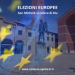 La statua di San Michele illuminata di blu per le elezioni europee